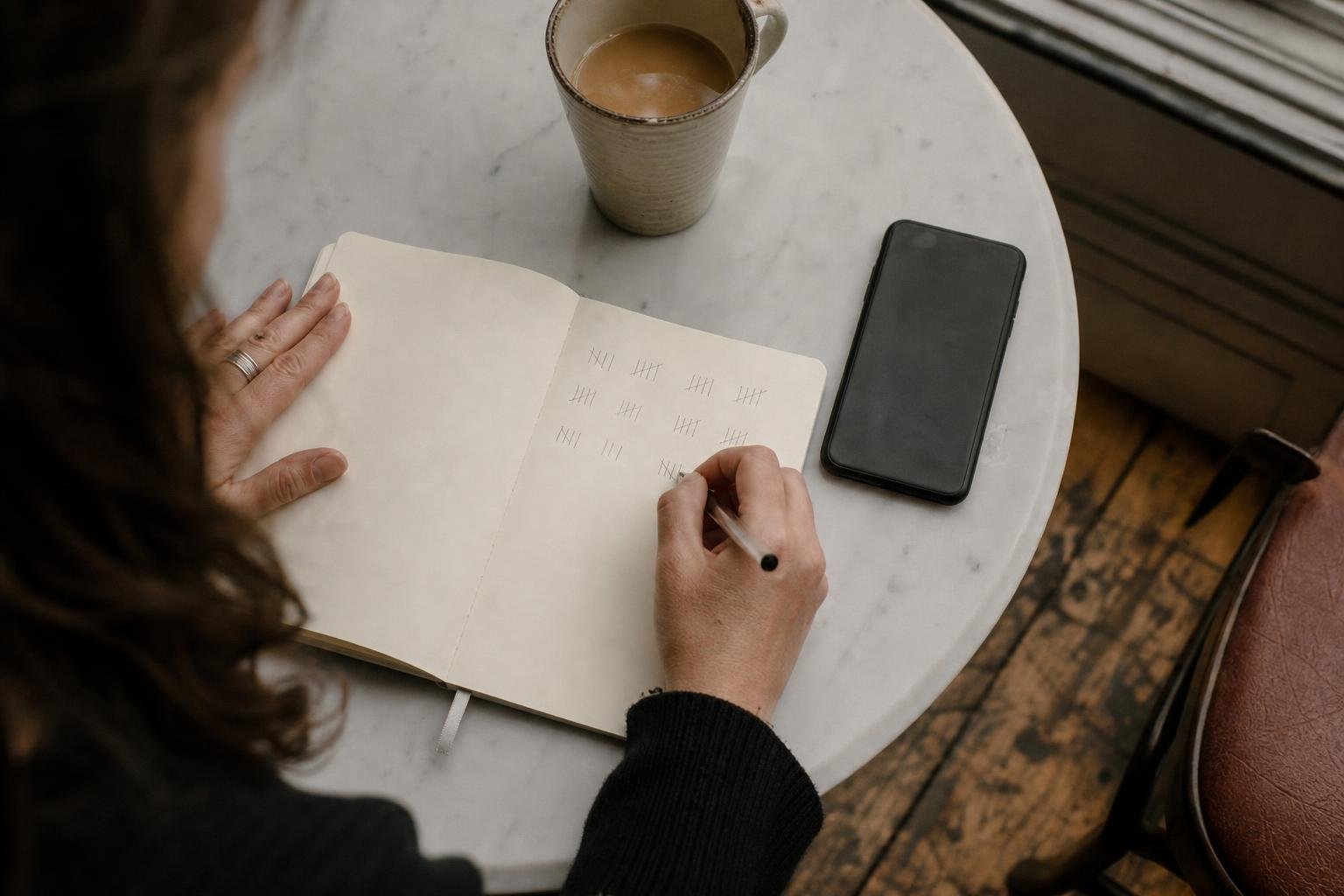 Counting salons in a notebook over coffee, the low-tech half of checking demand for a salon in a new area