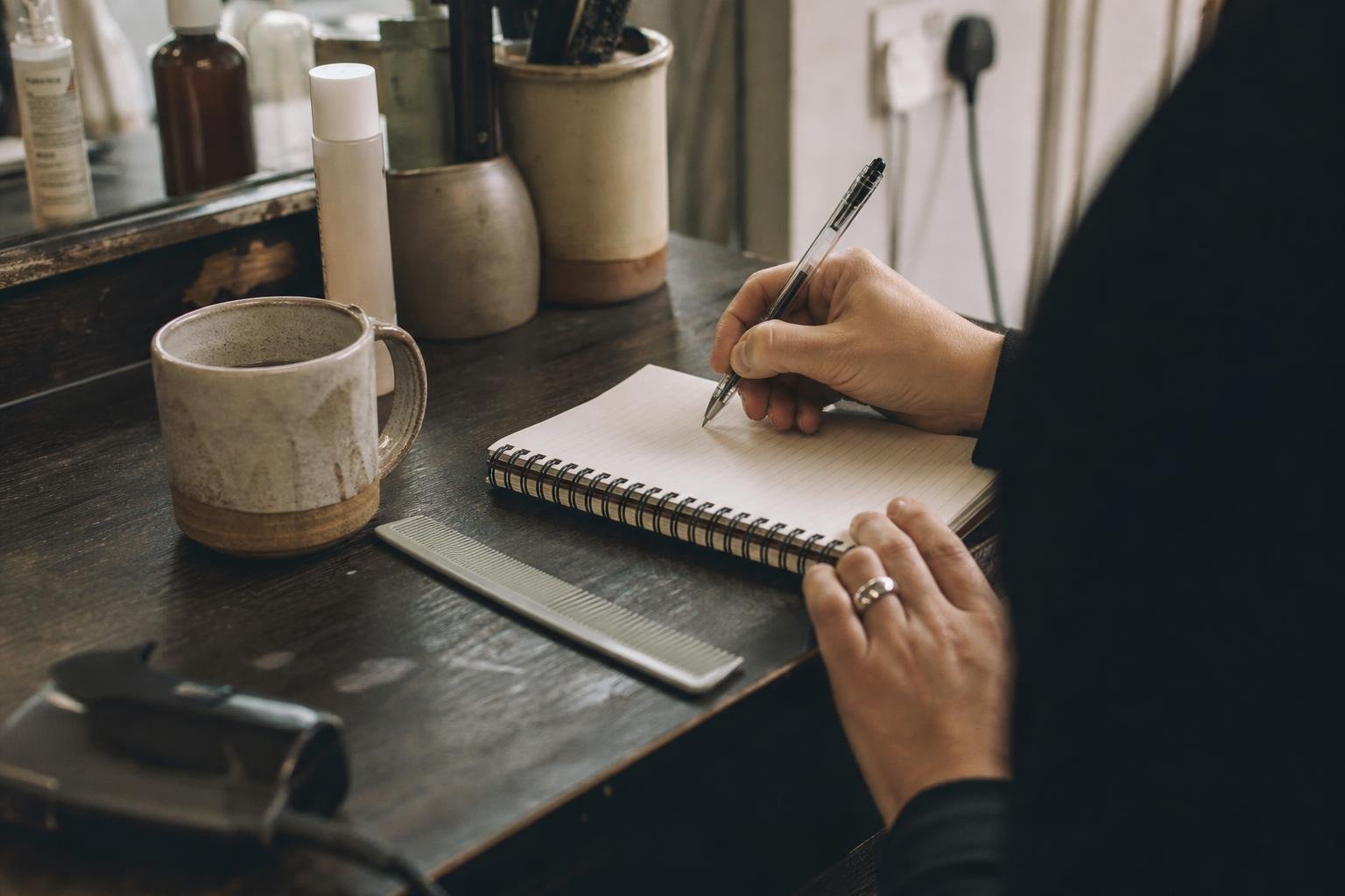 A stylist's hands listing the searches she wants, the words a Google Smart Campaign picks for her